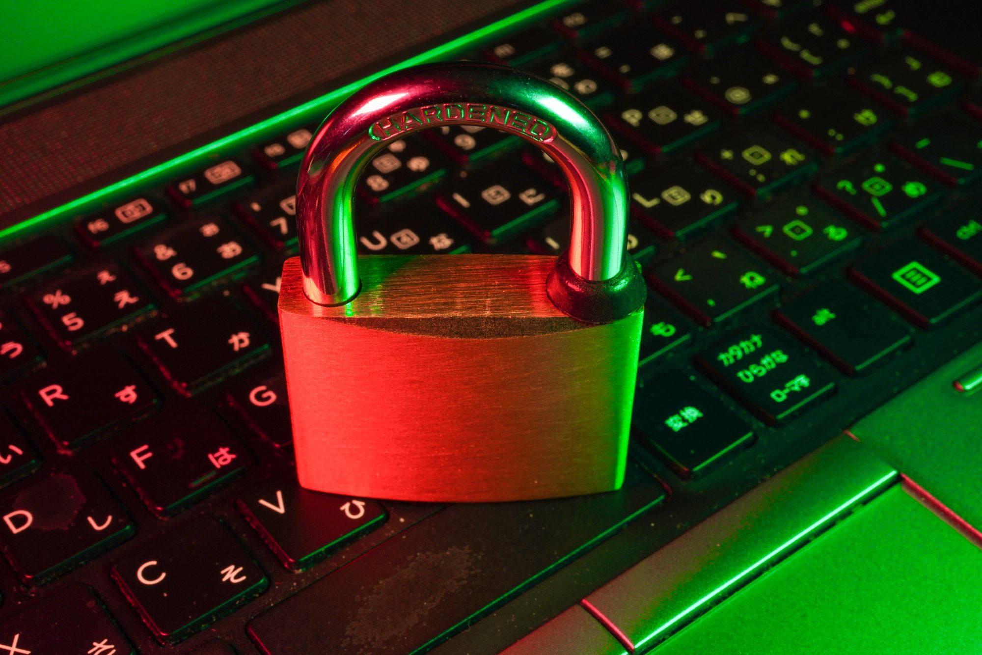 Laptop keyboard with a padlock on top.