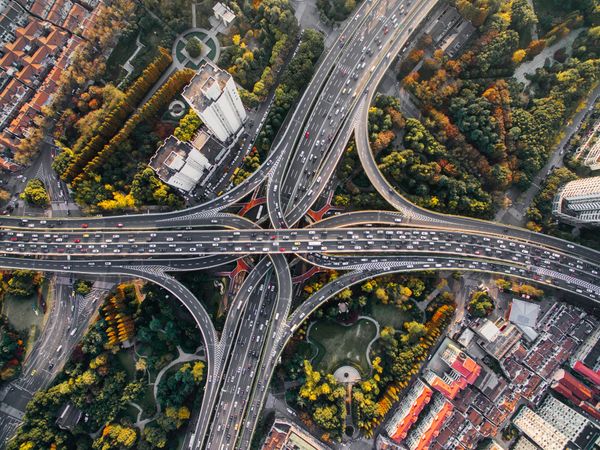 Birds eye view of congested highway intersection.